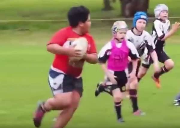 Nine-year-old Meaalofa Teo ran through opponents in the Canberra tournament. Picture: YouTube