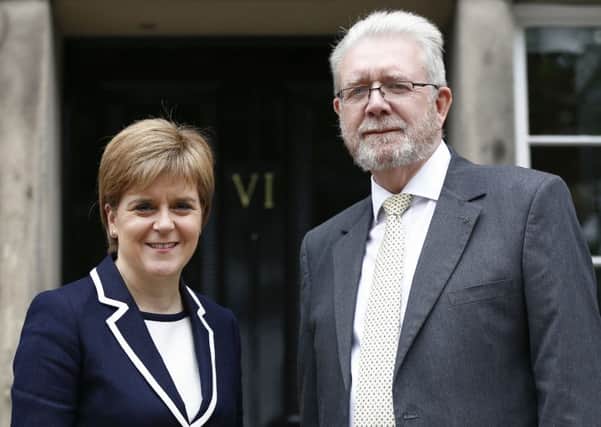 Nicola Sturgeon, pictured wit Mike Russell, will be keeping a close eye on any legal challenges