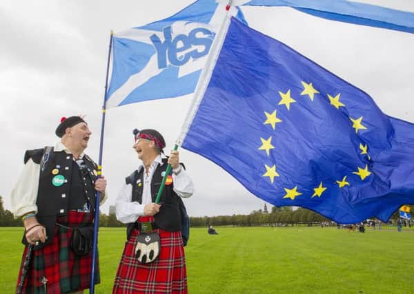 Nelson Keir and John Love join Scottish Independence supporters as they gather in Glasgow Green to mark the two year anniversary of the Scottish Referendum. Picture: SWNS