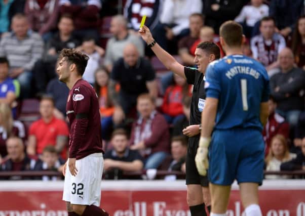 Tony Watt was booked after going to ground against Hamilton. Picture: SNS