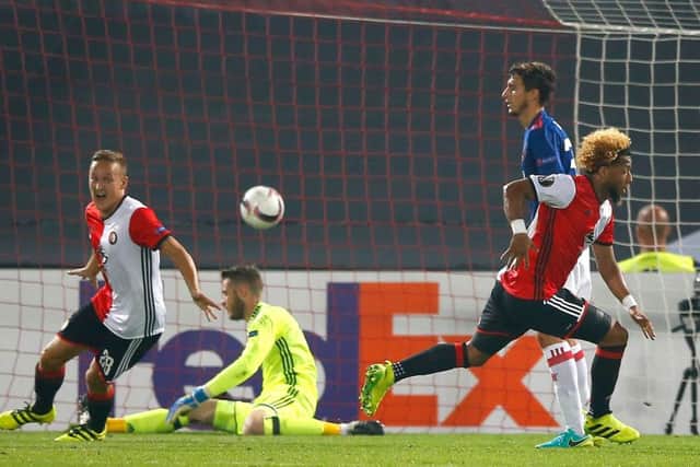 Tonny Vilhena, right, wheels away to celebrate his goal for Feyenoord. Picture: AP.