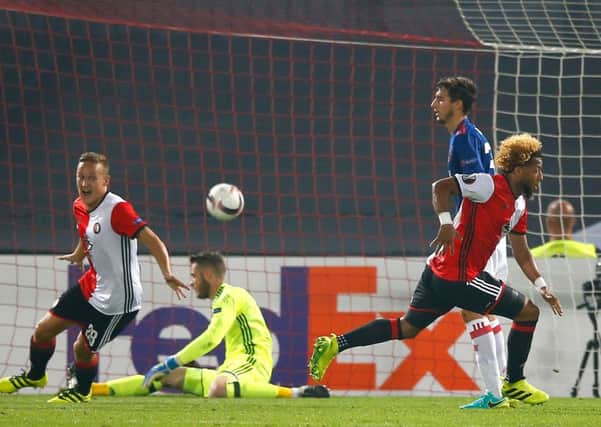 Tonny Vilhena, right, wheels away to celebrate his goal for Feyenoord. Picture: AP.