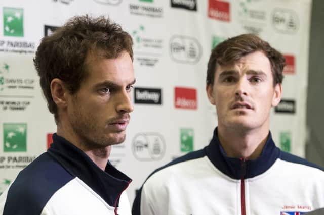 Andy Murray (left) and brother Jamie are mourning the death of their grandfather. Picture: SNS