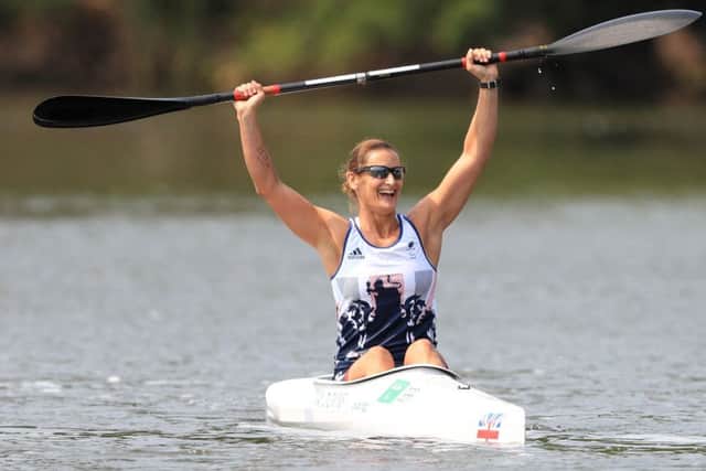 Great Britain's Anne Dickins celebrates winning gold in the Women's KL3 Final. Picture: PA.