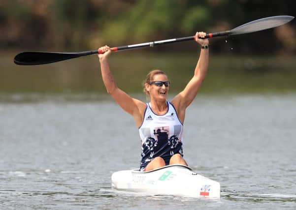 Great Britain's Anne Dickins celebrates winning gold in the Women's KL3 Final. Picture: PA.