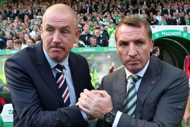 Rangers manager Mark Warburton had sympathy with Celtic couterpart Brendan Rodgers over the 7-0 defeat by Barcelona. Picture: Andrew Milligan/PA Wire