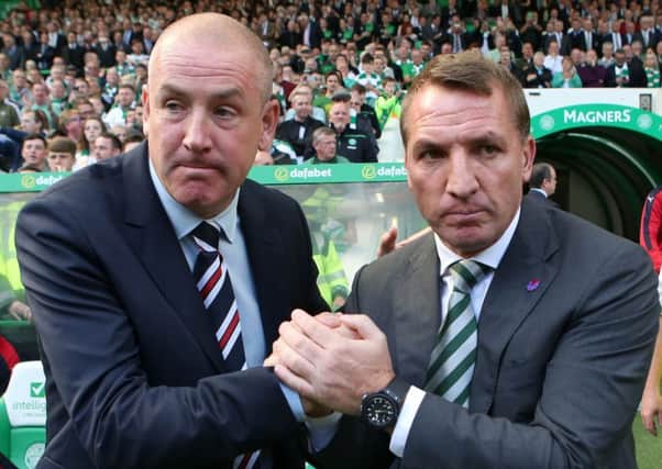 Rangers manager Mark Warburton had sympathy with Celtic couterpart Brendan Rodgers over the 7-0 defeat by Barcelona. Picture: Andrew Milligan/PA Wire