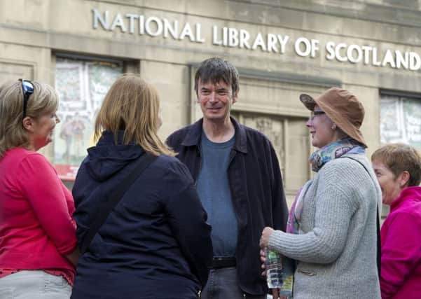 Author Ian Rankin speaks to group outside the National Library of Scotland during a tour around Edinburgh's Old Town to support Maggies Centres. Picture: Ian Rutherford