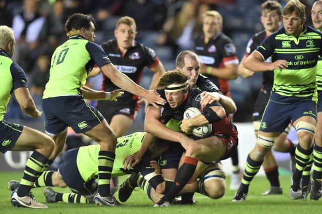 Edinburgh's Hamish Watson, centre, breaks away from Leinster's Devin Toner to score in the home side's defeat at Murrayfield. Picture: Gary Hutchison/SNS Group