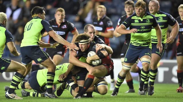 Edinburgh's Hamish Watson, centre, breaks away from Leinster's Devin Toner to score in the home side's defeat at Murrayfield. Picture: Gary Hutchison/SNS Group