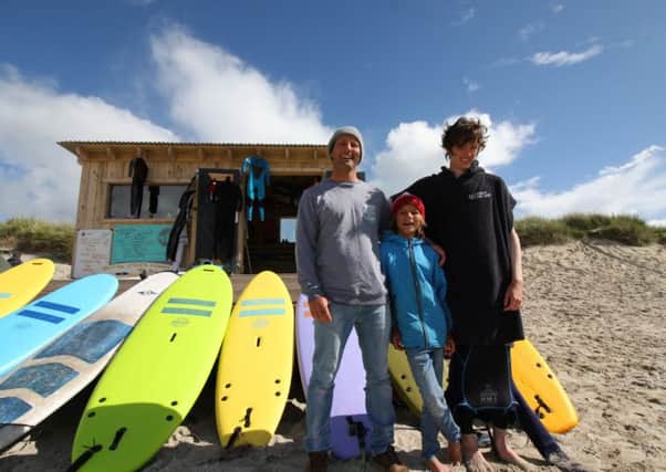 (Left to right) Tiree Surf Club members Marti Larg, Ben Larg and Andrew Robertson
 at the Beach shack hut on Tiree. Picture: Contributed