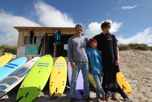 (Left to right) Tiree Surf Club members Marti Larg, Ben Larg and Andrew Robertson
at the Beach shack hut on Tiree. Picture: Contributed