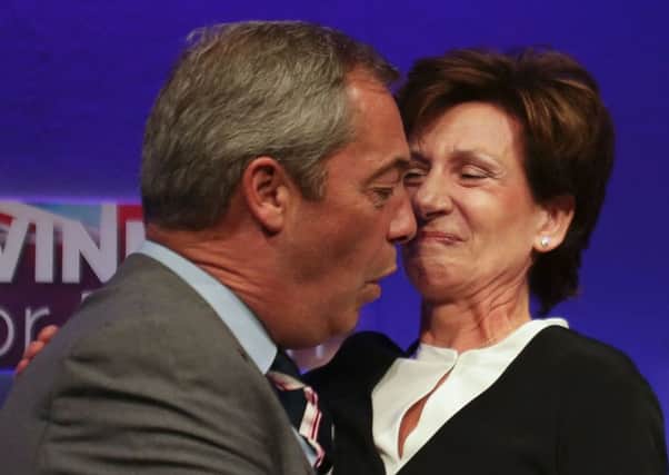 Nigel Farage embraces Diane James as the new leader at the Ukip autumn conference in Bournemouth. Picture: 
Daniel Leal-Olivas/Getty