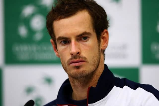 A solemn Andy Murray faces the media after his defeat. Picture: Clive Brunskill/Getty Images