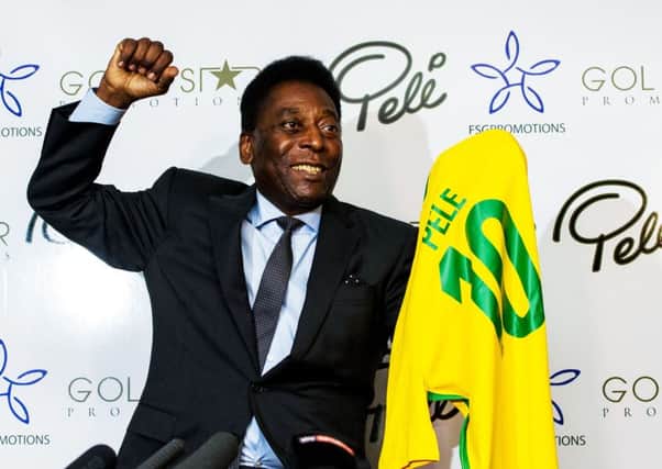 Pele plays to the crowd in Glasgow last night. Picture: SNS.