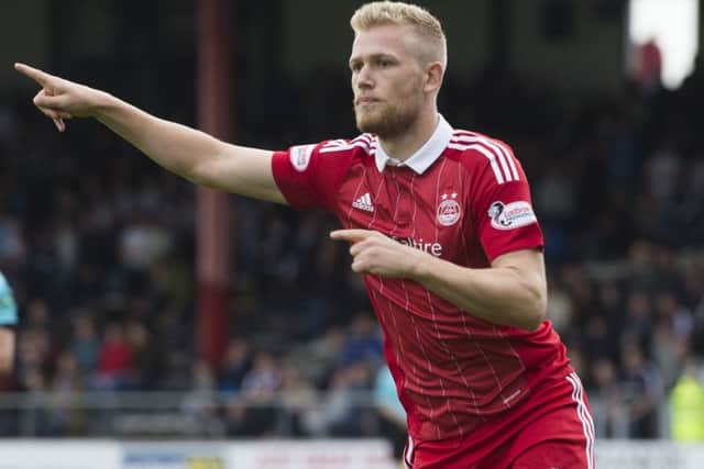Aberdeen's Jayden Stockley celebrates his goal. Picture; SNS