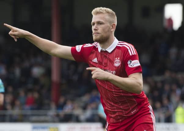 Aberdeen's Jayden Stockley celebrates his goal. Picture; SNS