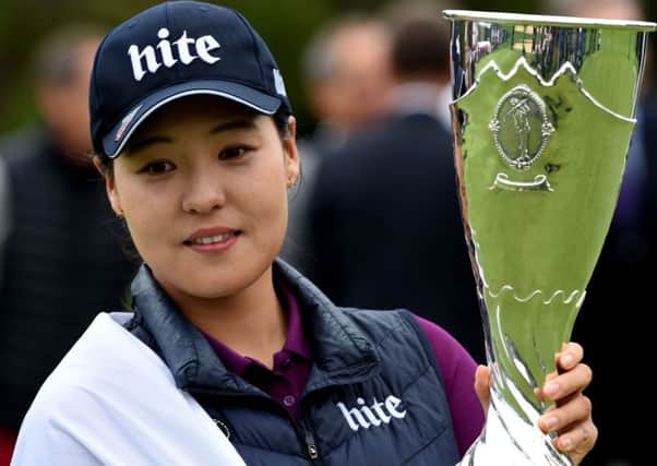 South Korea's In Gee Chun poses with her trophy after winning the Evian Championship. Picture: Getty