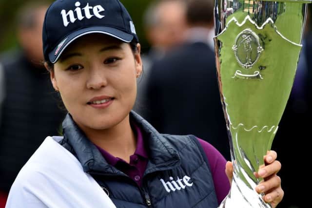 South Korea's In Gee Chun poses with her trophy after winning the Evian Championship. Picture: Getty