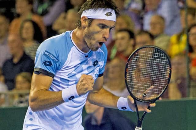Argentina's Leonardo Mayer celebrates winning a point against Dan Evans. Picture: SNS