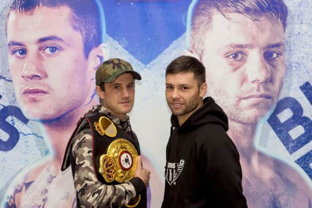 Ricky Burns, left, and Belarusian Kiryl Relikh met in Glasgow yesterday to promote their 7 October fight. Picture: SNS.