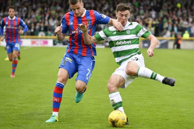 Celtic's Kieran Tierney, right, is determined to experience cup glory for the first time this season. Picture: SNS.