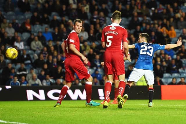 Rangers' Jason Holt opens the scoring in the League Cup quarter-final against Queen of the South. Picture: Craig Williamson/SNS