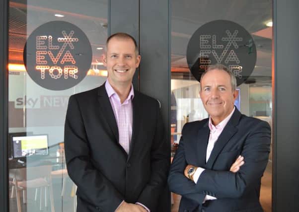 Burness Paull partner Callum Sinclair, left, with Elevator chief executive Gary McEwan. Picture: Contributed