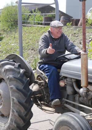 Thumbs up from Frank Oxley as he returns from the tractor run.