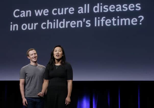 Mark Zuckerberg, left, and his wife, Priscilla Chan, have a new lofty goal: to cure, manage or eradicate all disease by the end of this century. Picture: AP