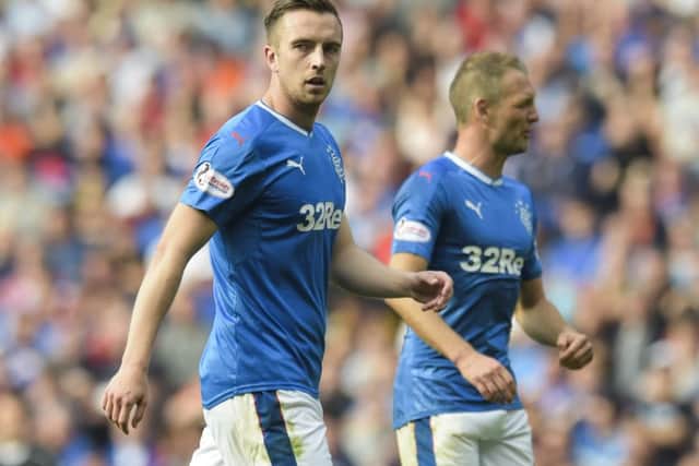 Danny Wilson, left, and Clint Hill have formed the Rangers centre back duo the past two games. Picture: SNS
