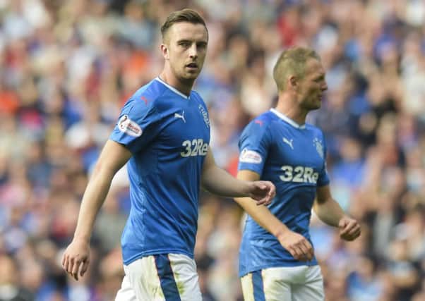 Danny Wilson, left, and Clint Hill have formed the Rangers centre back duo the past two games. Picture: SNS