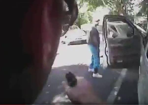 This police body camera screen shows Keith Lamont Scott looking on as a police officer aproaches in Charlotte, North Carolina on September 20, 2016.
Picture: Getty Images