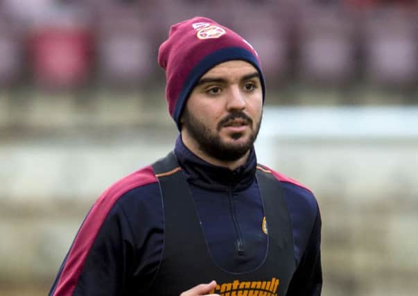 Hearts' Alim Ozturk has found himself as third choice centre back this season. Picture: SNS