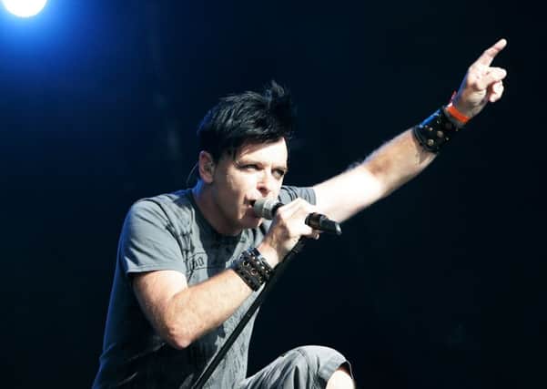PADDOCK WOOD, UNITED KINGDOM - JULY 05:  Gary Numan performs live on stage during The Mighty Boosh Festival at The Hop Farm on July 5, 2008 in Paddock Wood, Kent, England. 30,000 people attended the one day comedy and music festival, with The Charlatans, The Kills, Gary Numan and stars from TV comedy, The Mighty Boosh performing live.  (Photo by Simone Joyner/Getty Images)