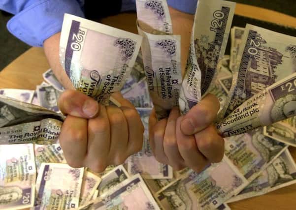 Scottish currency causes anxiety in other parts of the UK if people are unfamiliar with what it looks like. Picture: Bill Henry
