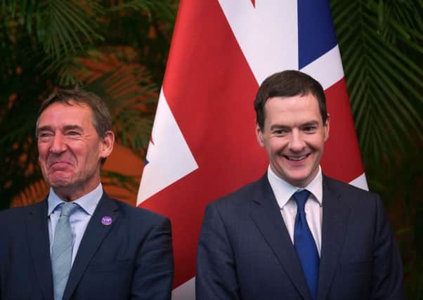 George Osborne sharing a light moment with Commercial Secretary to the Treasury Jim O'Neill
Picture: Getty Images