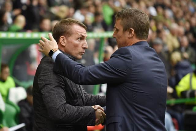 Celtic manager Brendan Rodgers (left) with Kilmarnock manager Lee Clark