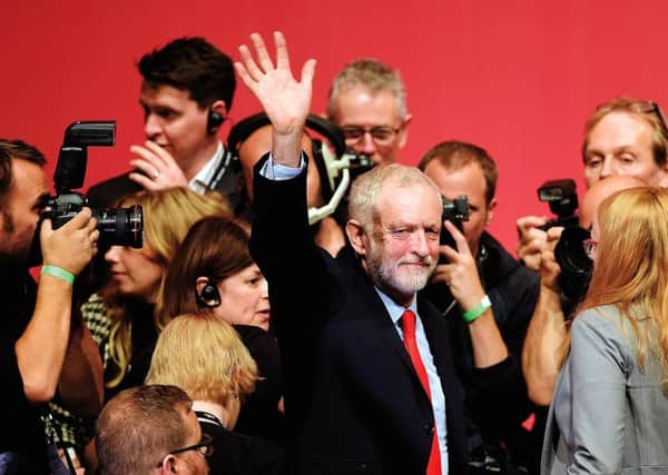 Corbyn celebrates victory in Liverpool. Picture: Joe Giddens/PA