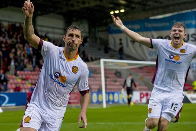24/09/16 LADBROKES PREMIERSHIP
PARTICK THISTLE V MOTHERWELL
FIRHILL - GLASGOW
Motherwell's Scott McDonald (left) celebrates his equaliser