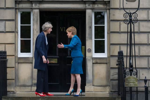First Minister Nicola Sturgeon meets Prime Minister Theresa May at Bute House. Picture: TSPL