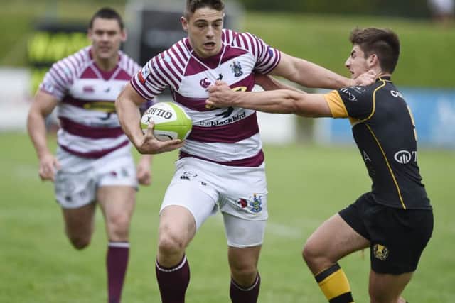 Watsonians Mark Bertram hands off Currie scrum-half Charlie Shiel at Myreside. Picture: Ian Rutherford.