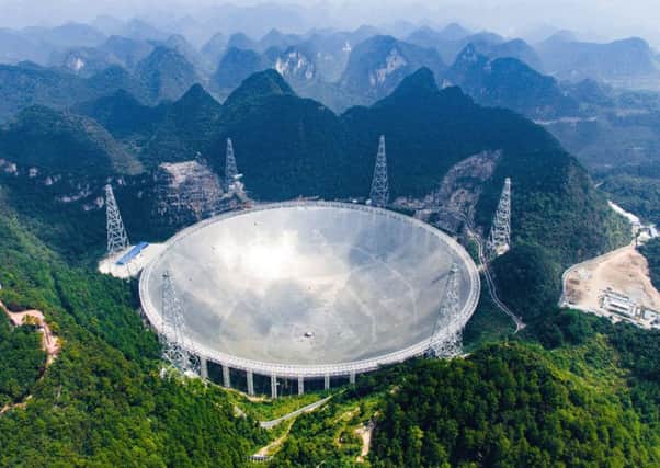 China has begun operating the world's largest radio telescope to help search for extraterrestrial life. 
Picture: AP