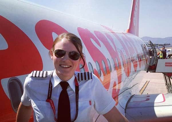 Kate McWilliams, a British woman who is believed to have become the world's youngest ever commercial airline captain at just 26. Picture: PA