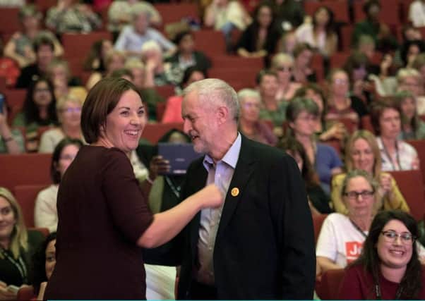 Scottish Labour leader Kezia Dugdale greets newly re-elected Labour leader Jeremy Corbyn. (Photo by Stefan Rousseau - WPA Pool/Getty Images)