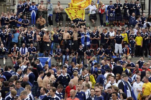 Scotland fans flock to Trafalgar Square . Picture: Phil Wilkinson