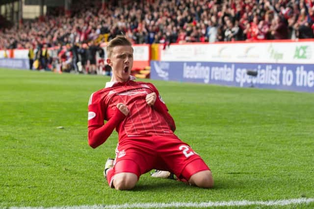 Aberdeen's James Maddison celebrates scoring the winning goal in yesterday's clash with Rangers. Picture: PA
