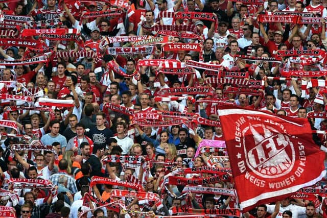 Koln fans use the tune of the popular Scottish song for their own anthem. Picture: AFP/Getty