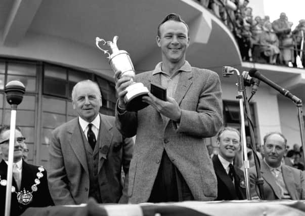 Arnold Palmer with the famous Claret Jug after winning The Open Championship trophy at Royal Birkdale in 1961. Picture: PA Wire.