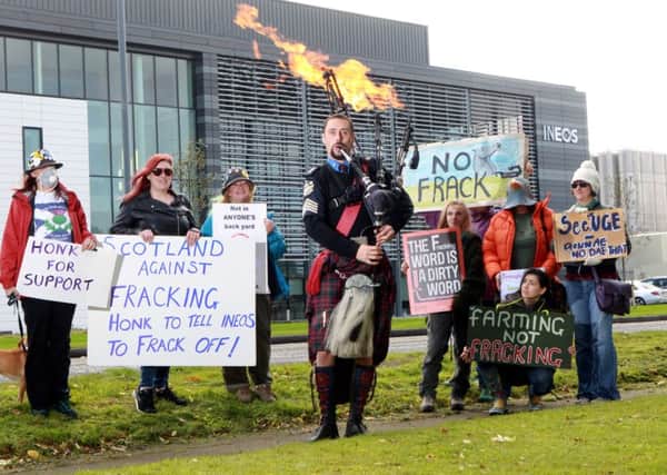 Protesters outside Grangemouth oil refinary yesterday as the Ineos Insight gas carrier arrived with the first with shipment of shale gas.